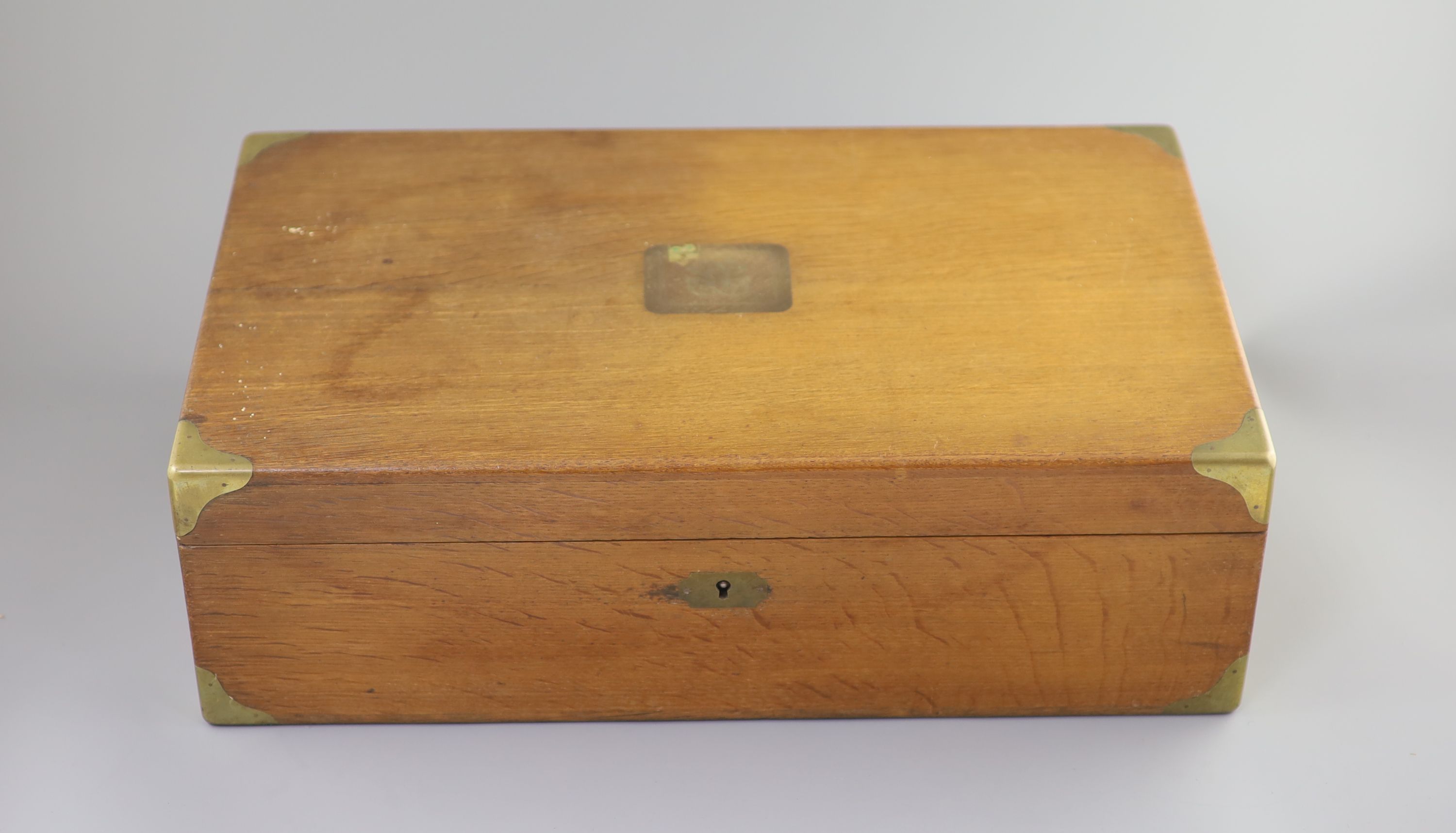 A late 19th century French canteen of silver 950 standard cutlery, in a brass mounted oak canteen, by Prevost Recipon & Cie (Maison Odiot)